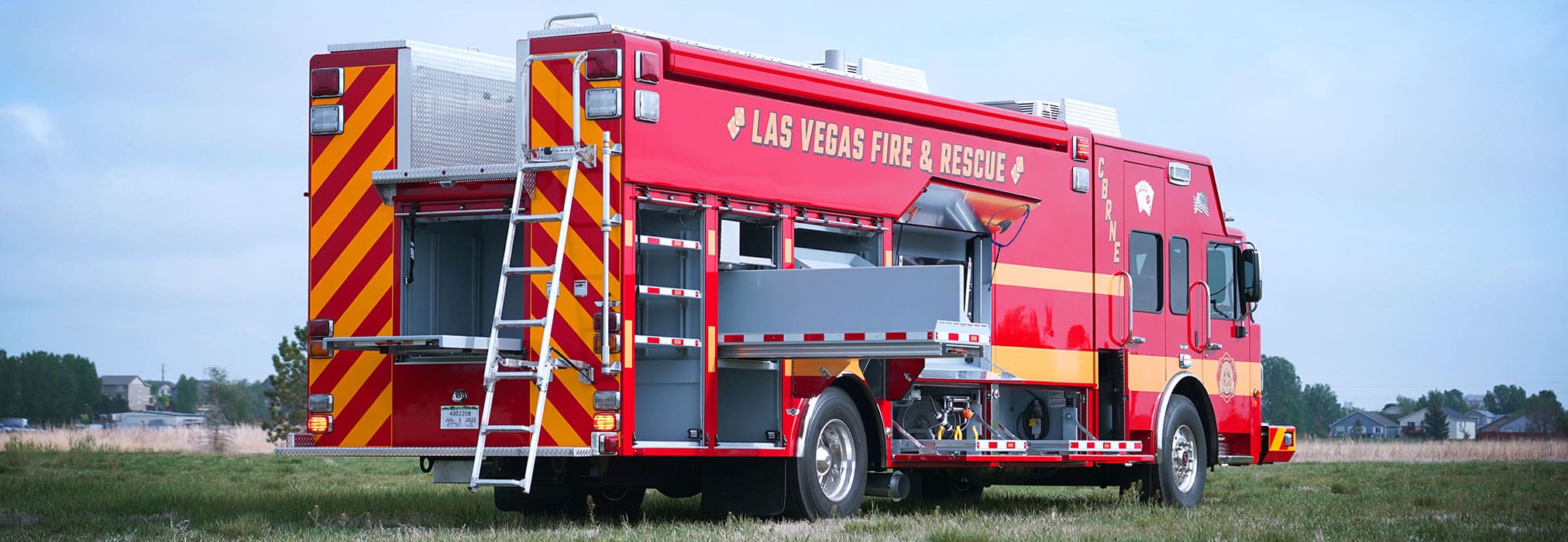 rear curbside view of Las Vegas walk-in hazmat apparatus with doors open