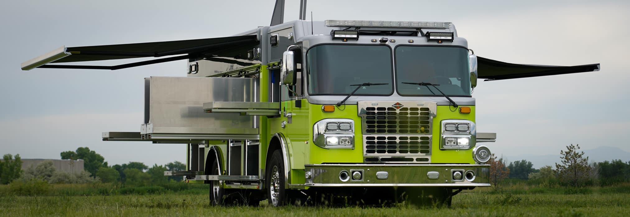 front curbside view of Santa Fe Fire Rescue Air/Light rescue truck with OnScene slides open