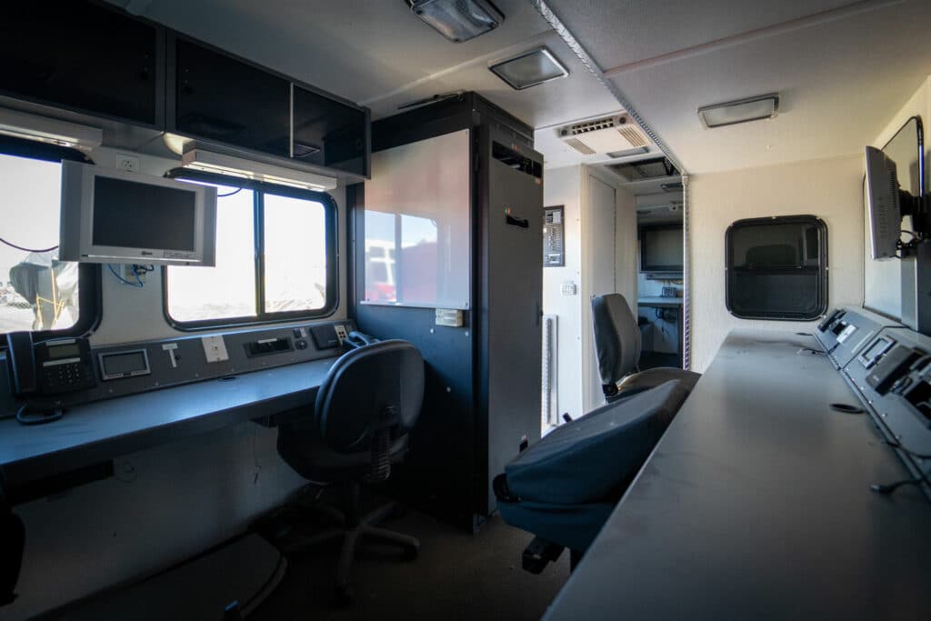 inside of hazmat command center with two desk areas
