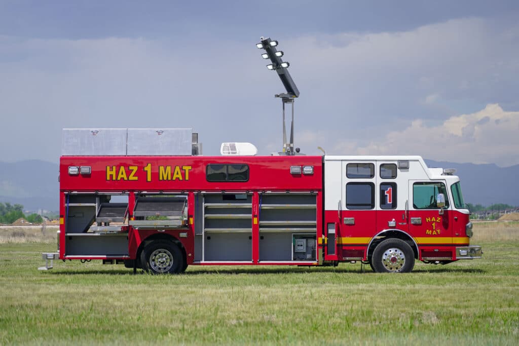 curbside open view of Brevard County Fire Rescue walk-in hazmat mobile command center with Command Light extended