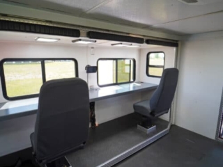 BrevardCounty_FL_hz_1272-Interior-Body-SlideOut-02 interior desk of Brevard County Fire Rescue walk-in hazmat mobile command center