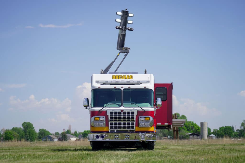 front of Brevard County Fire Rescue walk-in hazmat mobile command center with Command Light extended