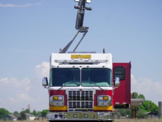 BrevardCounty_FL_hz_1272-Streetside-Open-1 front of Brevard County Fire Rescue walk-in hazmat mobile command center with Command Light extended