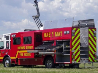 BrevardCounty_FL_hz_1272-Streetside-Open-4 rear street side view of Brevard County Fire Rescue walk-in hazmat mobile command center with Command Light extended